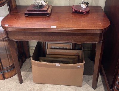 Lot 689 - A 19th century mahogany tea table, the...