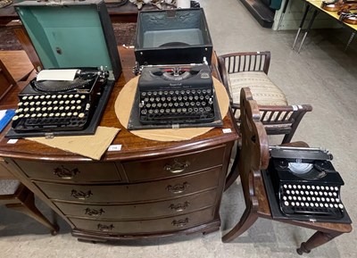 Lot 717 - A group of three vintage typewriters to...
