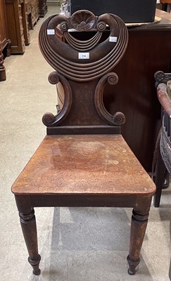 Lot 719 - A 19th century mahogany hall chair with shell...