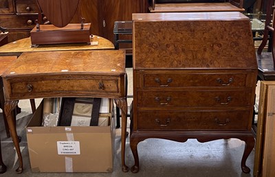 Lot 723 - A 20th century walnut inverted bowfront side...