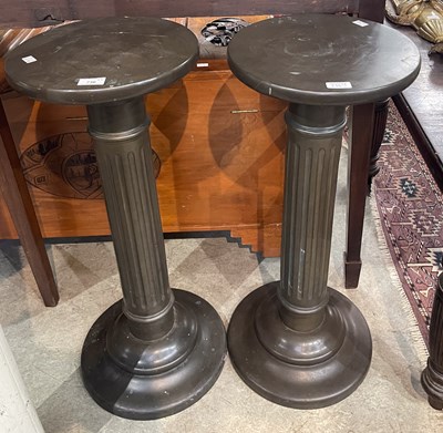 Lot 736 - A pair of composite jardiniere stands, the...