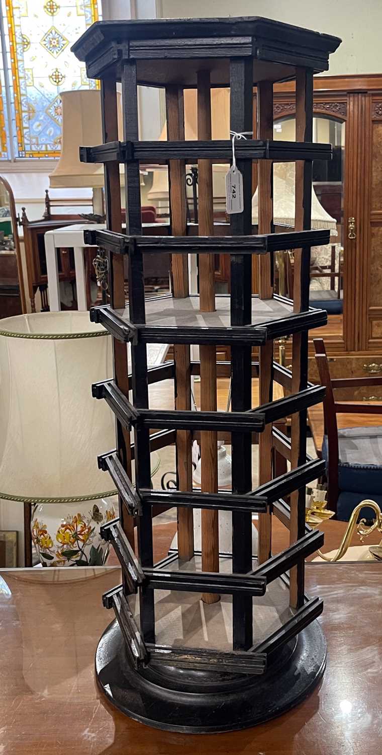 Lot 742 - A hexagonal shaped revolving postcard display...