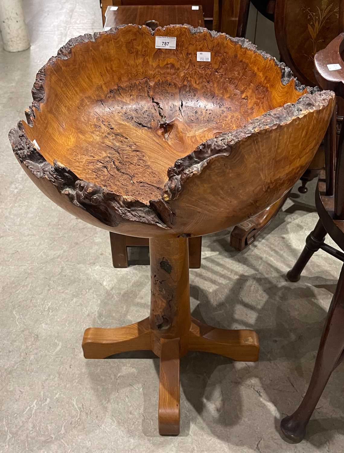 Lot 787 - A burr elm jardiniere stand by William...