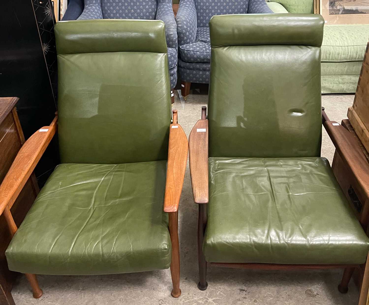 Lot 797 - Guy Rogers, a pair of reclining armchairs with...
