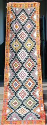 Lot 169 - A Maimana Kilim runner, the blue ground worked...