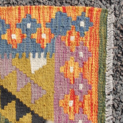 Lot 174 - A Maimana Kilim rug, the ochre coloured ground...