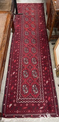 Lot 862 - A Persian madder ground runner, the...