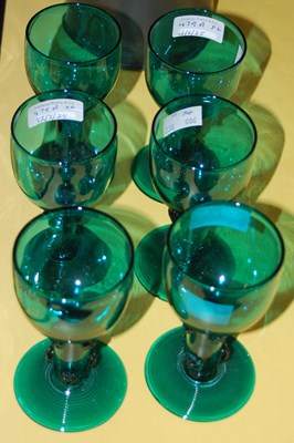 Lot 479A - A set of six green tinted glass Roemer type...