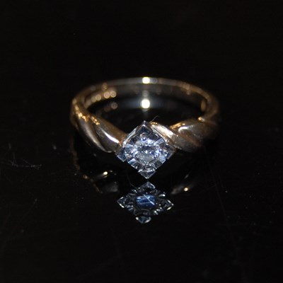 Lot 34B - A 9ct gold and diamond single stone ring,...