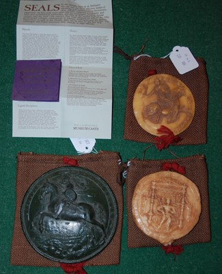 Lot 569E - Three reproduction wax seals, one in green, 13....
