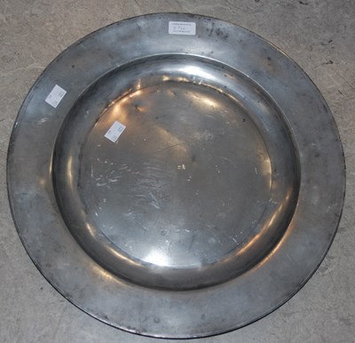 Lot 571C - An 18th century large pewter charger with...