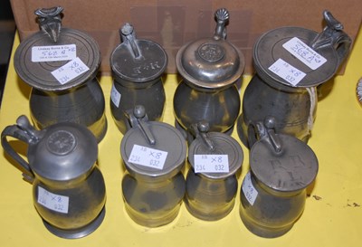 Lot 568A - A group of eight pewter lidded baluster...
