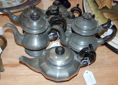 Lot 570F - Six Britannia metal small afternoon teapots...