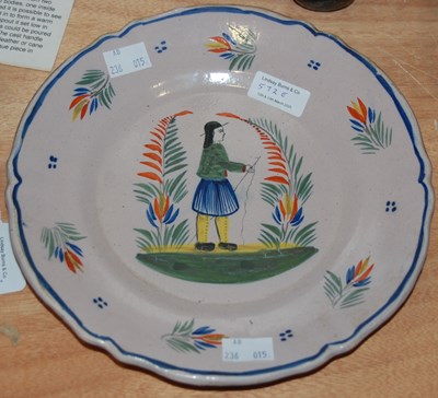 Lot 572E - A Quimper pottery plate, decorated with figure...
