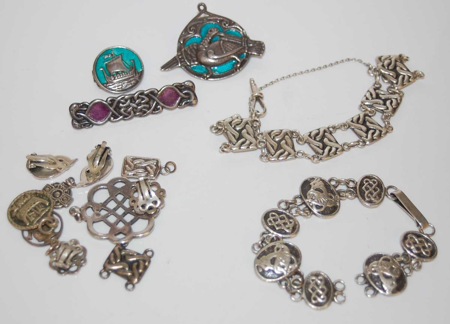 Lot 34 - A collection of silver and white metal Iona...