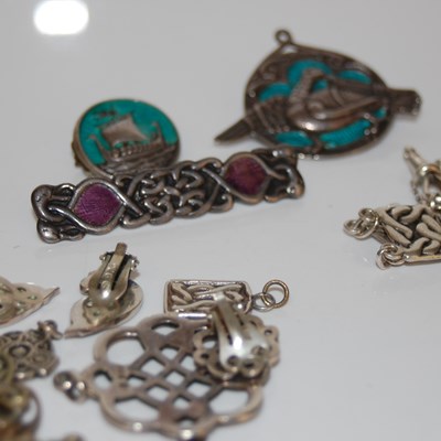 Lot 34 - A collection of silver and white metal Iona...