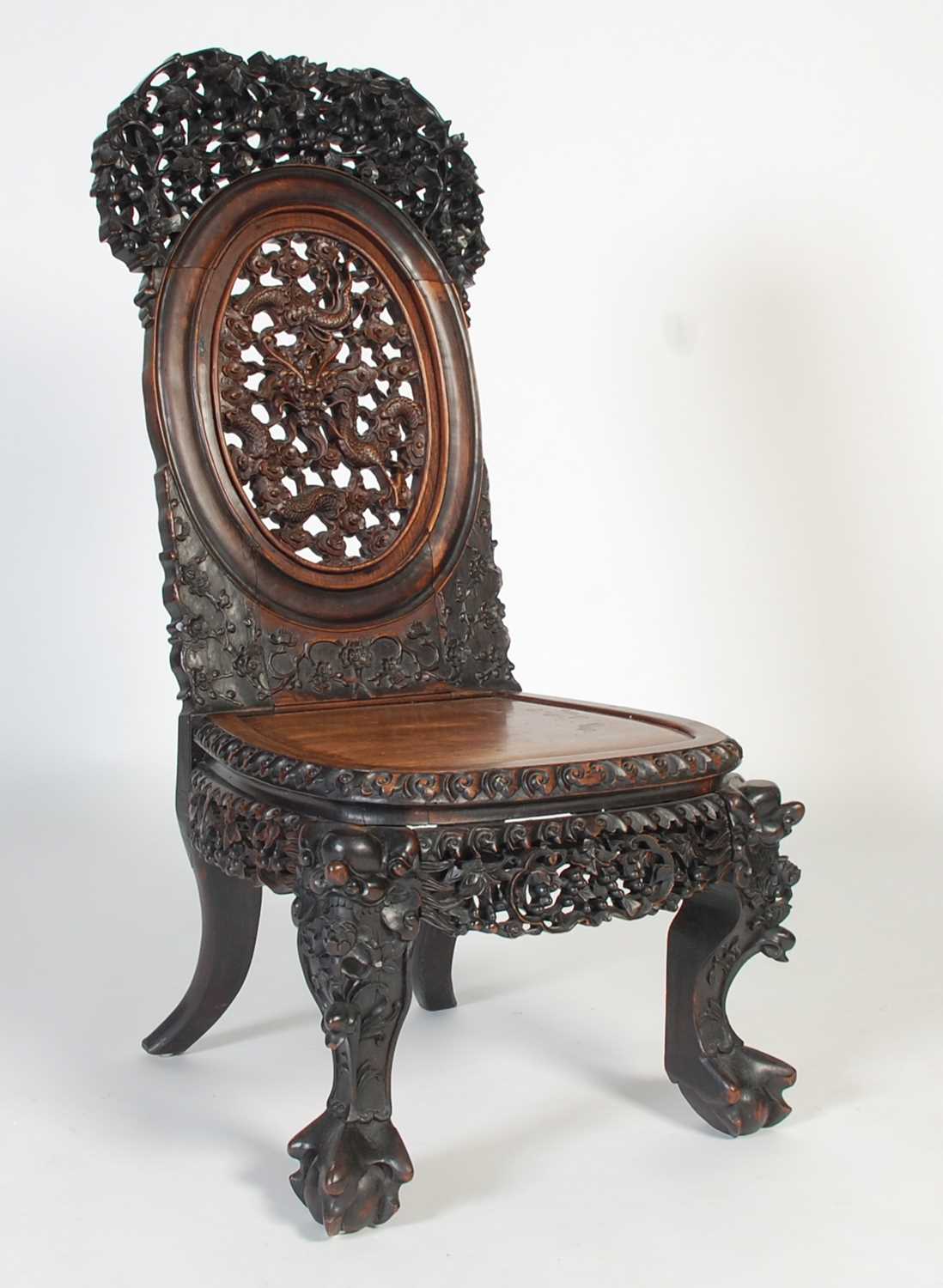 Lot 21 - A Chinese darkwood chair, late Qing Dynasty,...