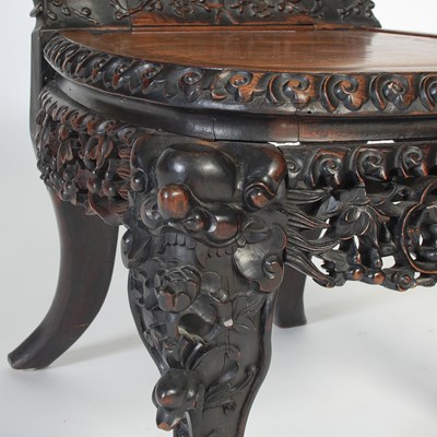 Lot 21 - A Chinese darkwood chair, late Qing Dynasty,...