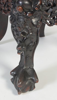 Lot 21 - A Chinese darkwood chair, late Qing Dynasty,...