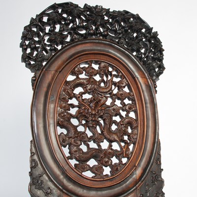 Lot 21 - A Chinese darkwood chair, late Qing Dynasty,...