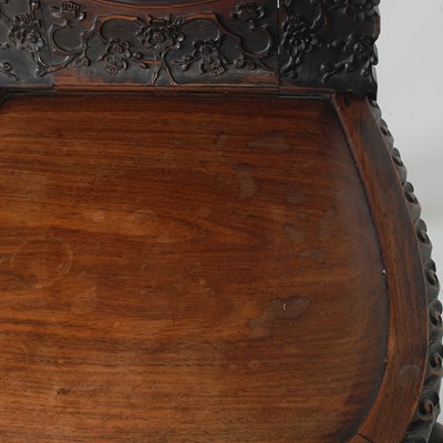 Lot 21 - A Chinese darkwood chair, late Qing Dynasty,...