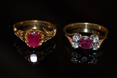 Lot 177F - A yellow metal, ruby and diamond five stone...