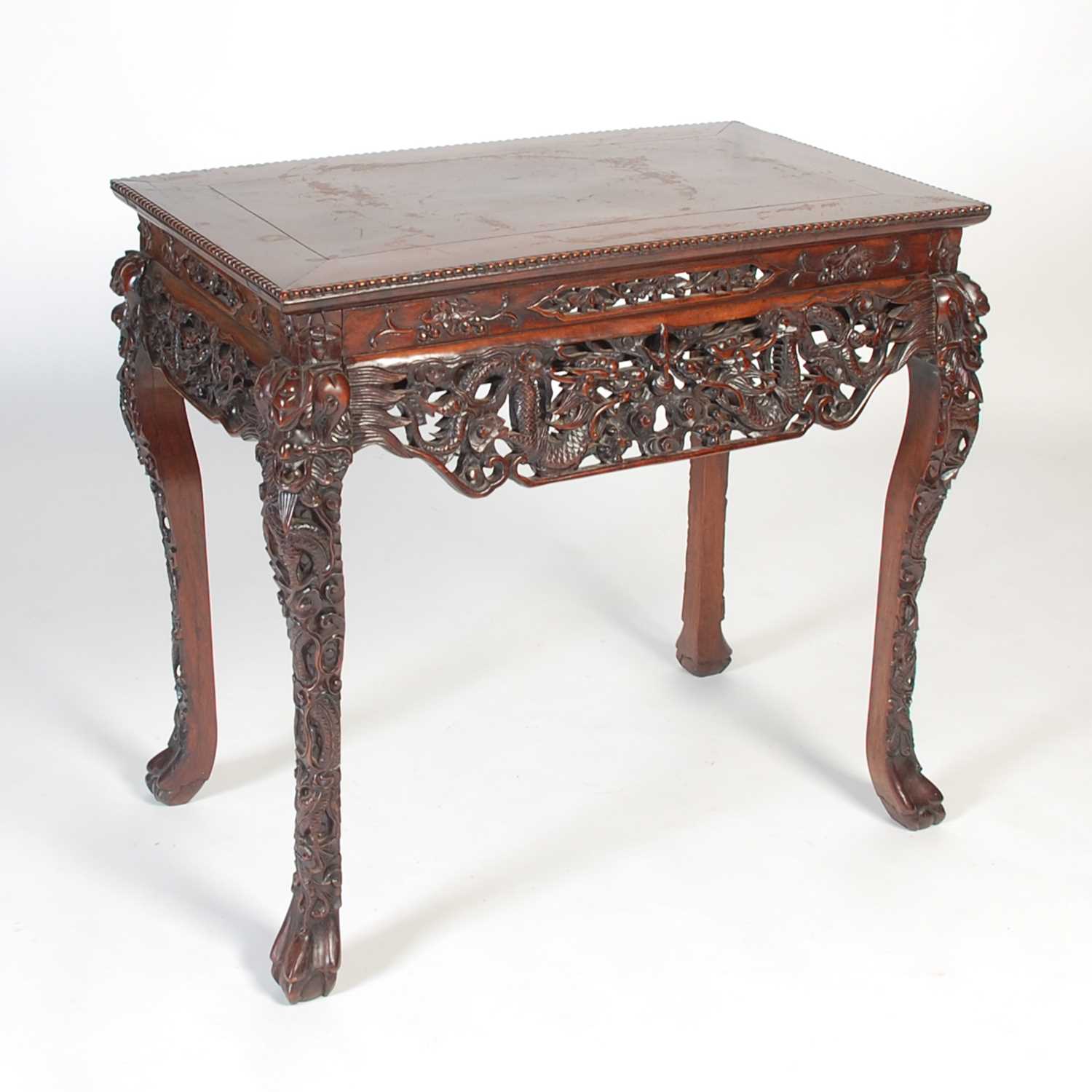 Lot 94 - A Chinese darkwood centre table, late 19th/...