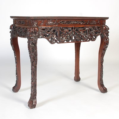 Lot 94 - A Chinese darkwood centre table, late 19th/...