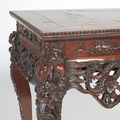 Lot 94 - A Chinese darkwood centre table, late 19th/...