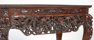 Lot 94 - A Chinese darkwood centre table, late 19th/...