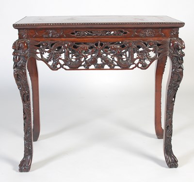Lot 94 - A Chinese darkwood centre table, late 19th/...