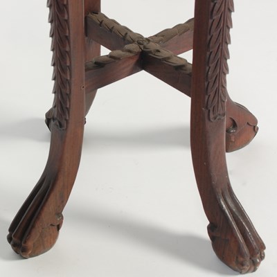 Lot 35 - A Chinese darkwood urn stand, late Qing...
