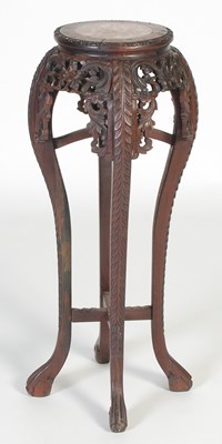 Lot 35 - A Chinese darkwood urn stand, late Qing...