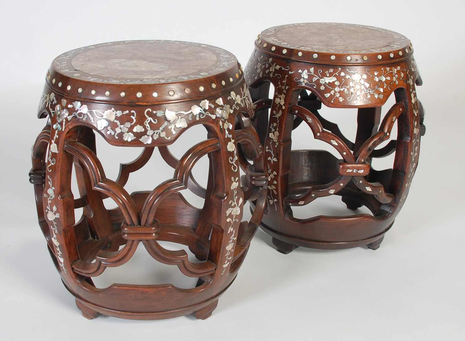 Lot 42 - A near pair of Chinese darkwood and...