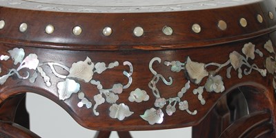 Lot 42 - A near pair of Chinese darkwood and...