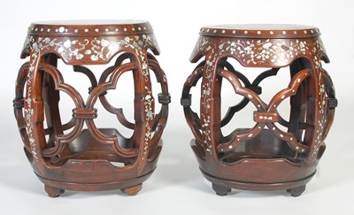 Lot 42 - A near pair of Chinese darkwood and...