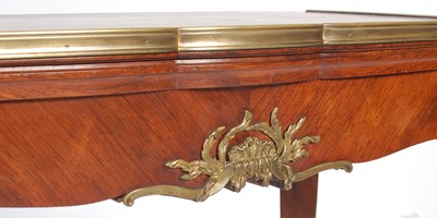 Lot 56 - A late 19th century French Kingwood and gilt...