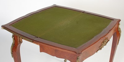 Lot 56 - A late 19th century French Kingwood and gilt...