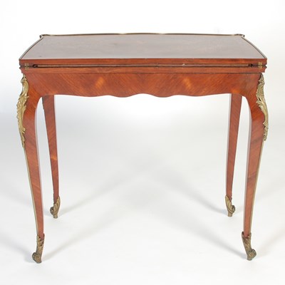 Lot 56 - A late 19th century French Kingwood and gilt...