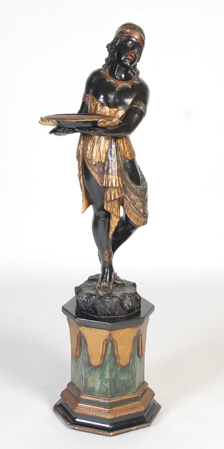 Lot 82 - A late 19th/ early 20th century carved and...