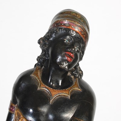 Lot 82 - A late 19th/ early 20th century carved and...