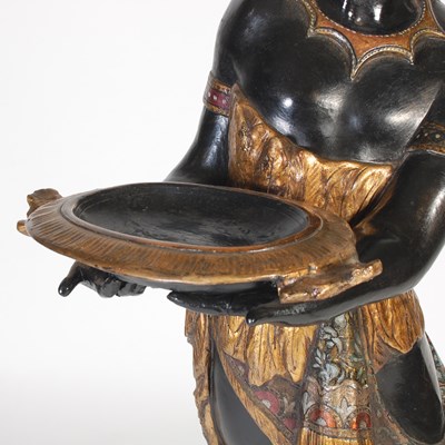 Lot 82 - A late 19th/ early 20th century carved and...
