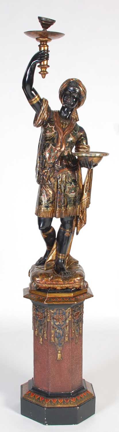 Lot 58 - A late 19th/ early 20th century carved and...