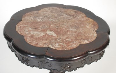 Lot 86 - A Chinese darkwood occasional table, late Qing...