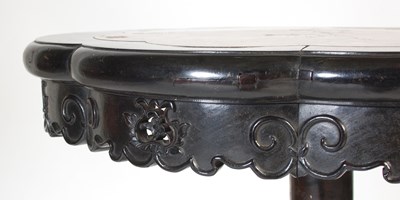Lot 86 - A Chinese darkwood occasional table, late Qing...