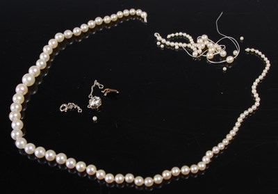 Lot 614 - A single-strand graduated pearl necklace, for...