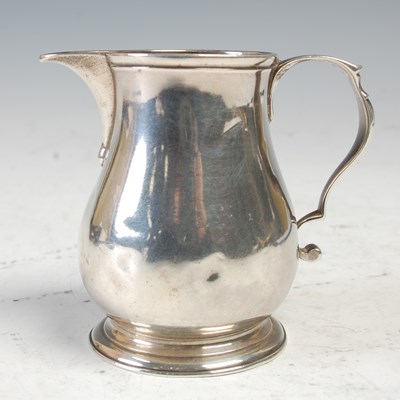 Lot 484 - A George II silver ‘sparrow beak’ cream jug,...