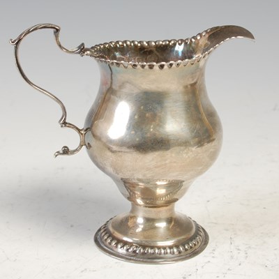 Lot 495 - A George III silver plain inverted pear shaped...