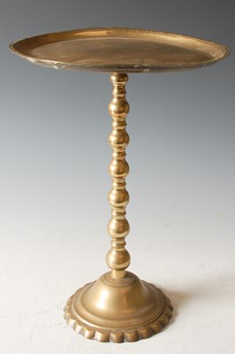 Lot 856 - An Indian brass wine table.