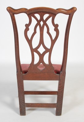 Lot 43 - A Scottish oak ‘gossip’ chair, by William...
